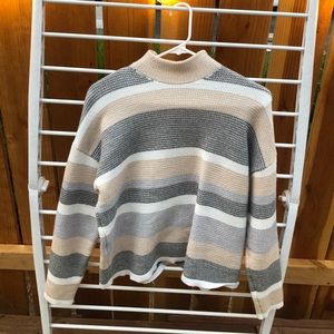 Striped long sleeve sweater.